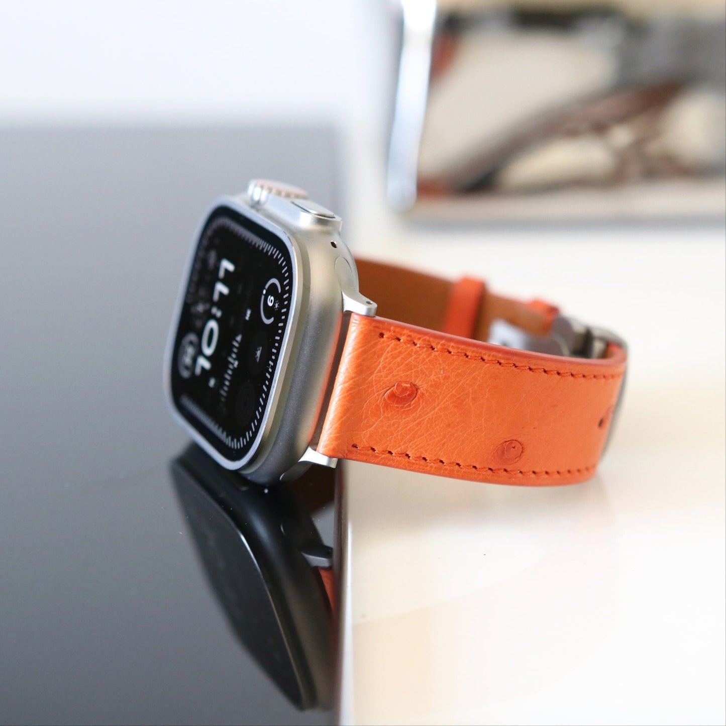 Apple Watch leather band in orange